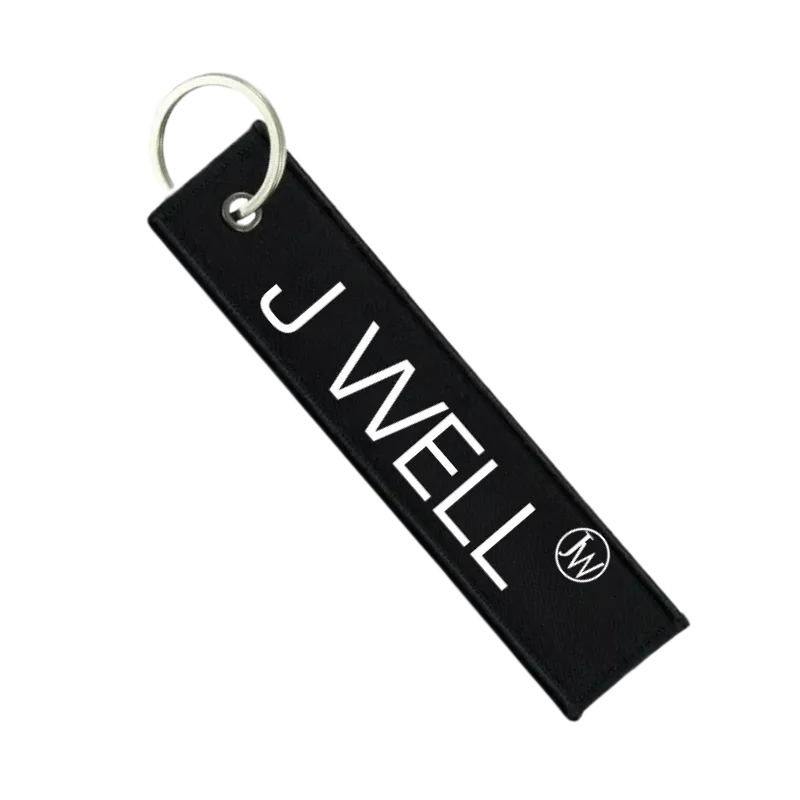 Porte-clés J WELL – Logo blanc sur tissu noir | J WELL